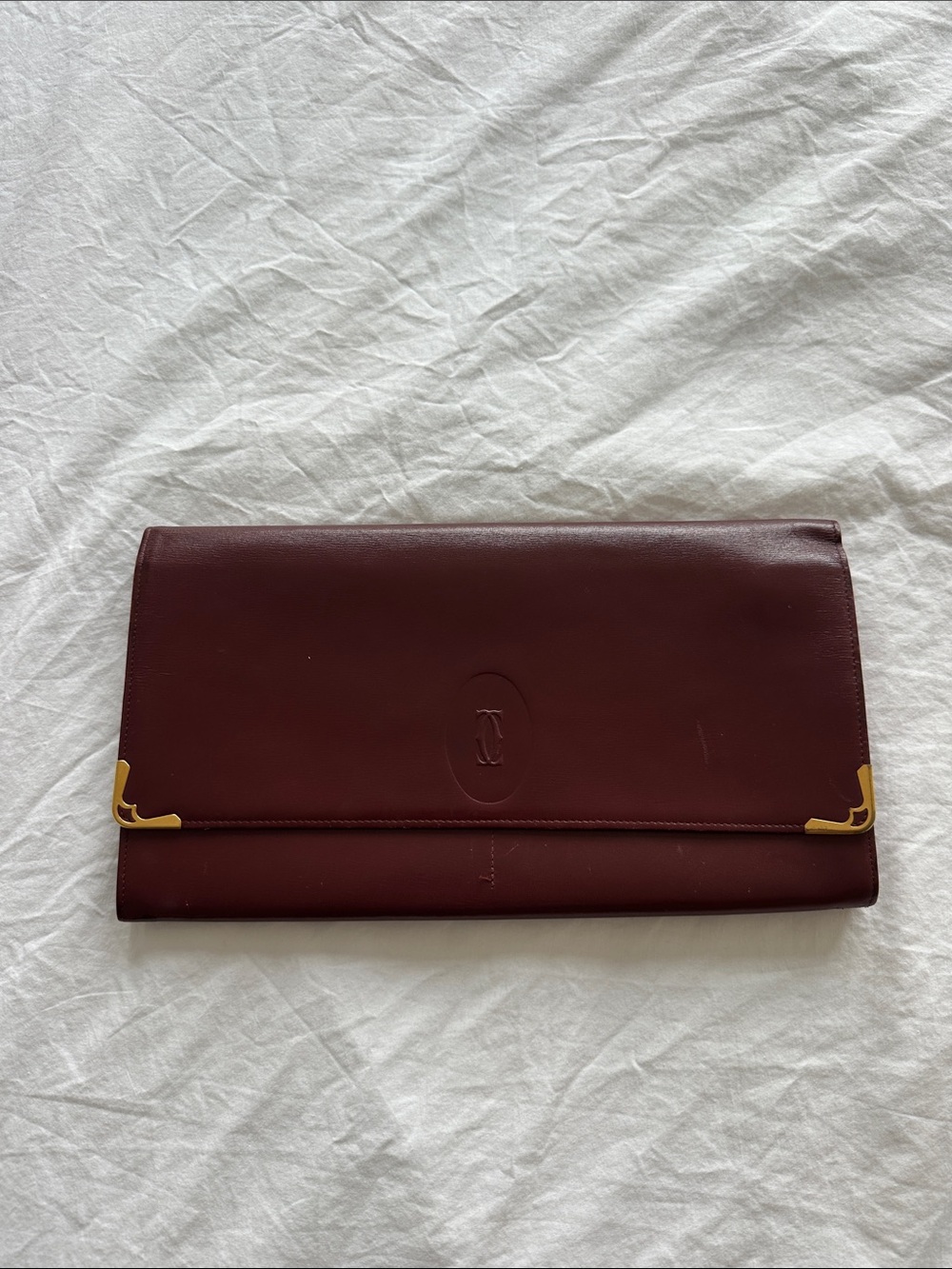 Cartier Burgundy Leather Clutch with Gold Corners